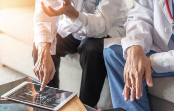 Surgical doctor teamwork, orthopedic surgeon, orthopedist, ER surgery team working in hospital medical clinic office meeting room diagnostic exam on patient care operation, professional service concept
