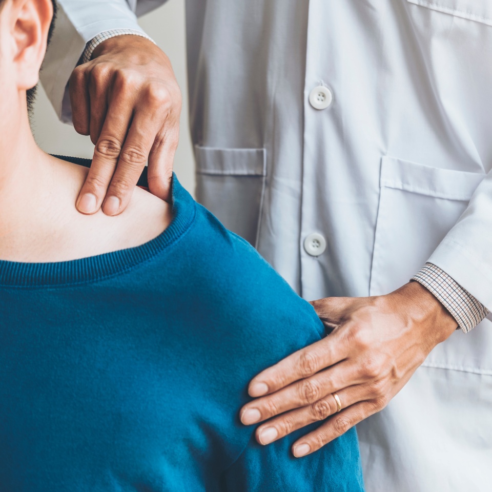 Physical Doctor consulting with patient About Shoulder muscule pain problems Physical therapy diagnosing concept