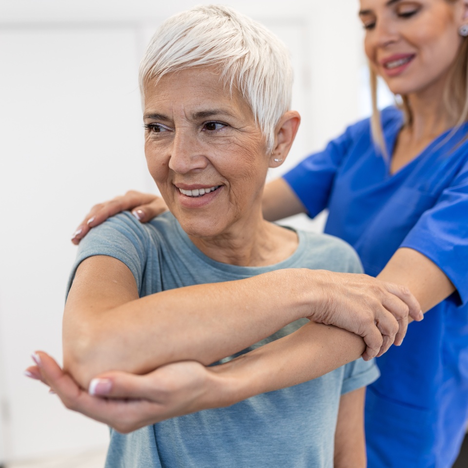 Professional therapists is stretching muscles, senior patient with abnormal muscular symptoms, physical rehabilitation therapies and treatment of physiological disorders by physiotherapists concept.