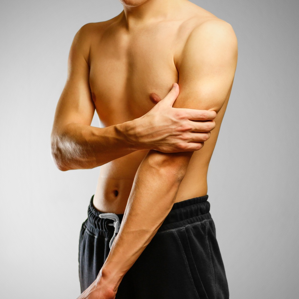 The guy with no shirt holding hand of a sick bicep. The pain in my arm. Sore biceps.
